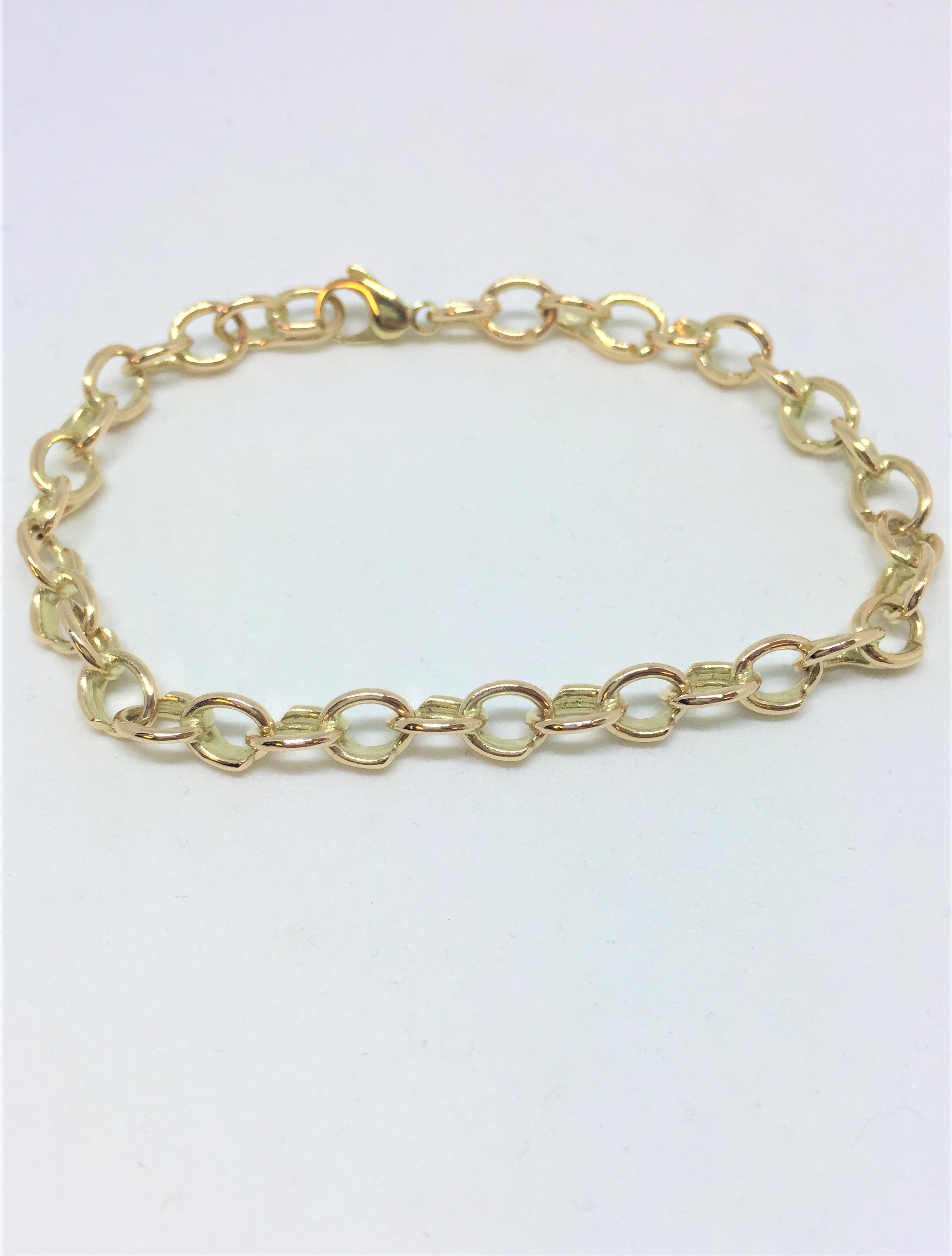 Lind Armbånd i Guld – Elegant Ledningsarmbånd